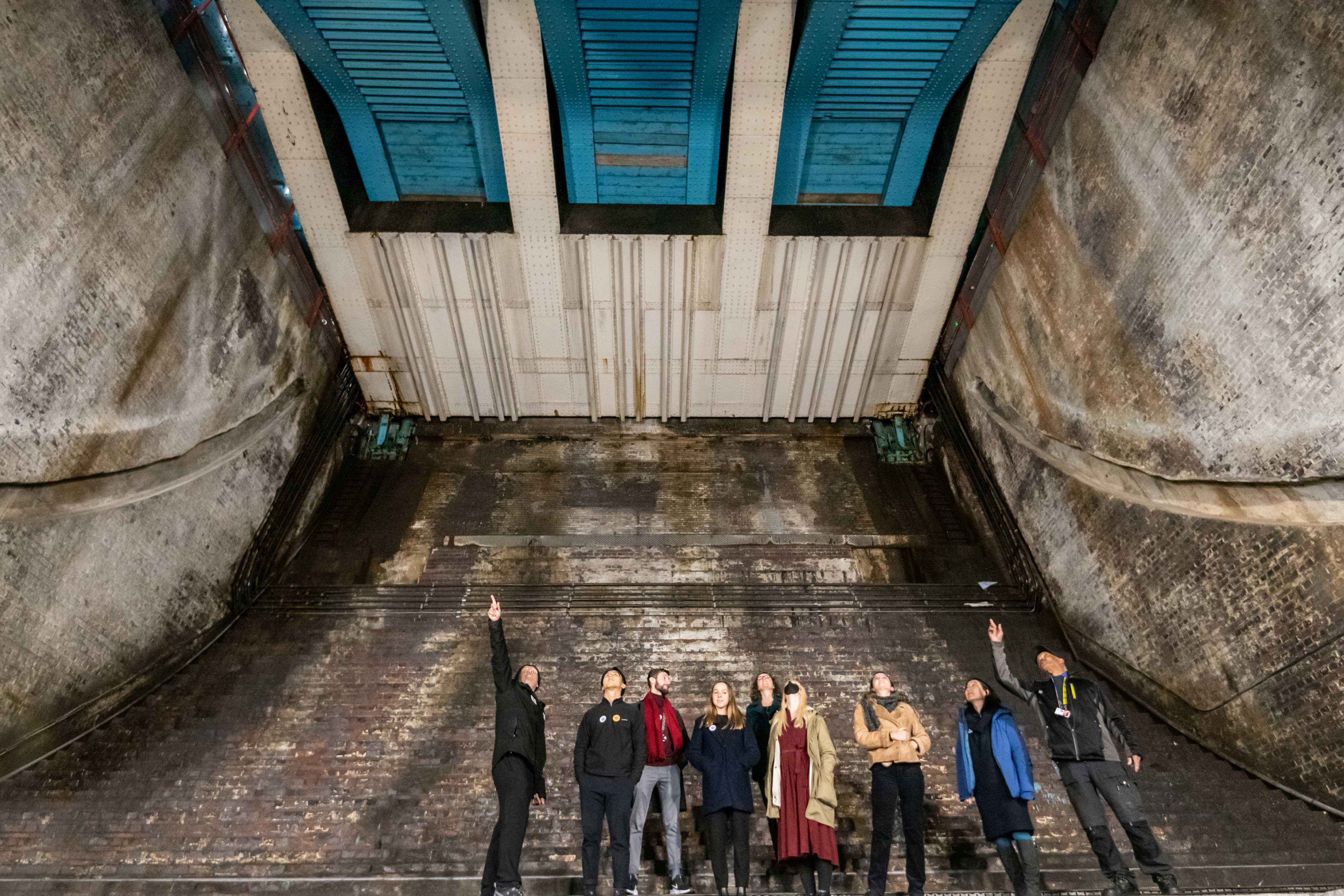 A group of visitors looking around the Bascule Chambers