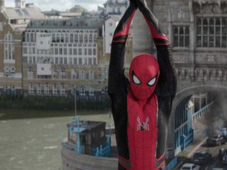 Spiderman swinging from Tower Bridge