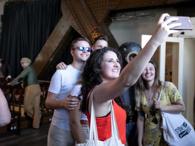 People take a selfie inside Tower Bridge